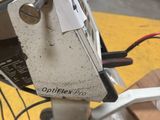 a close up of a bicycle with a box attached to it