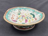 an image of a small bowl sitting on top of a table