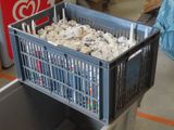 a metal crate filled with lots of different kinds of items