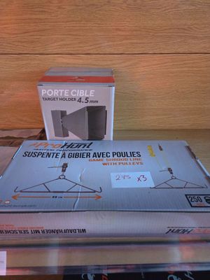two boxes of electronic devices sitting on a table
