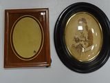 three framed pictures hanging on the wall next to each other
