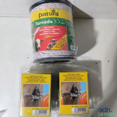 two packages of pet supplies sitting on a table