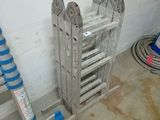 a ladder that is leaning against a wall next to a ladder