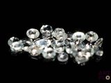 diamonds on a black surface with a black background