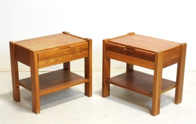 two wooden tables with a drawer on each of them