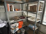a room that has a lot of shelves and boxes on it