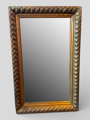 MIROIR biseauté, cadre en bois sculpté doré