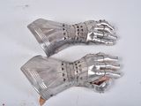 a pair of gloves that are sitting on a table
