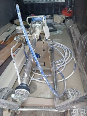 a truck that has a bunch of hoses in it