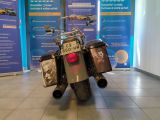 a motorcycle that is parked inside of a building