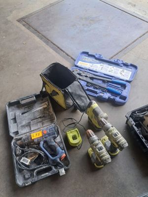 a lot of tools that are sitting on the floor