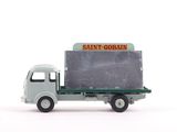 a toy truck that has a sign on the back of it