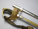 two swords and a sword on a white surface