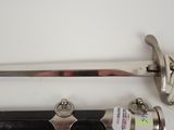 a sword that is laying on a table