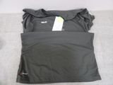 the top of a women ' s shirt with a tag on it