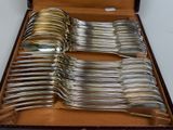 a box of silverware that is sitting on a table