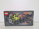 a box with a lego monster truck inside of it