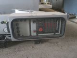 a picture of an old microwave sitting on the floor