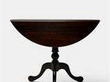 an image of a small table with a wooden top on a white background