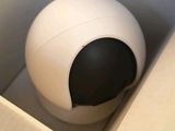 an image of a toilet with a ball in it