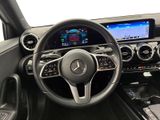 the interior of a mercedes car with a steering wheel and dashboard controls