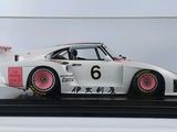 the model of a racing car is in a glass case
