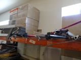 many boxes on the shelf in the room
