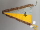 a yellow and gray pennant with a number 4 on it