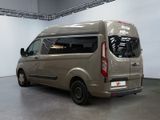 a silver van that is parked in a room