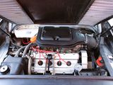 a picture of a car engine in the back of a truck