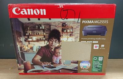 the box is open on a table with a woman and a child