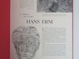 an open book with a drawing of a man ' s face on it