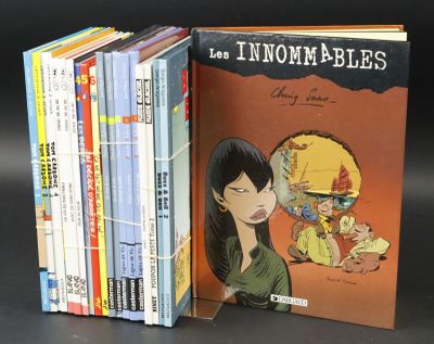 a lot of books that are sitting on a table