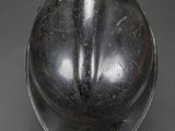 a close up of a metal object on a table