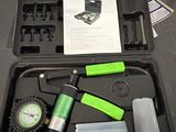 a tool kit in a black case on a table