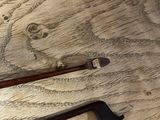 a pipe that is sitting on a wooden table