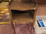 a small table with a book on top of it