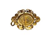 an image of a gold colored clock with a metal handle