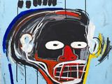 une peinture abstraite représentant le visage d'un homme sur fond bleu