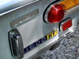 a close up of the rear end of a silver car