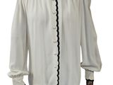 une chemise blanche à bordures noires sur un mannequin