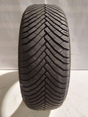 a close up of a tire on a white surface