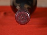 a bottle of wine that is sitting on a table