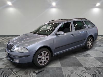 a picture of a blue car parked in a garage