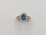 a sapphire and diamond cluster ring