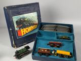 a box with a train set in it and a box with a train set in it