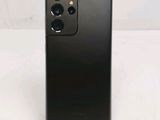 the back of a black phone with a camera attached to it