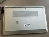 a laptop that is sitting on a table with a keyboard