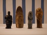 several different types of sculptures are displayed on a white surface