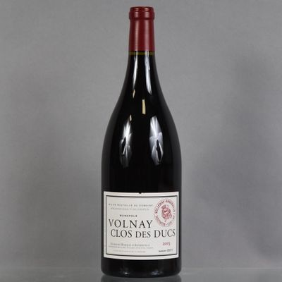 a bottle of wine that is sitting on a table